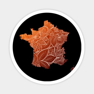 Colorful mandala art map of France with text in brown and orange Magnet